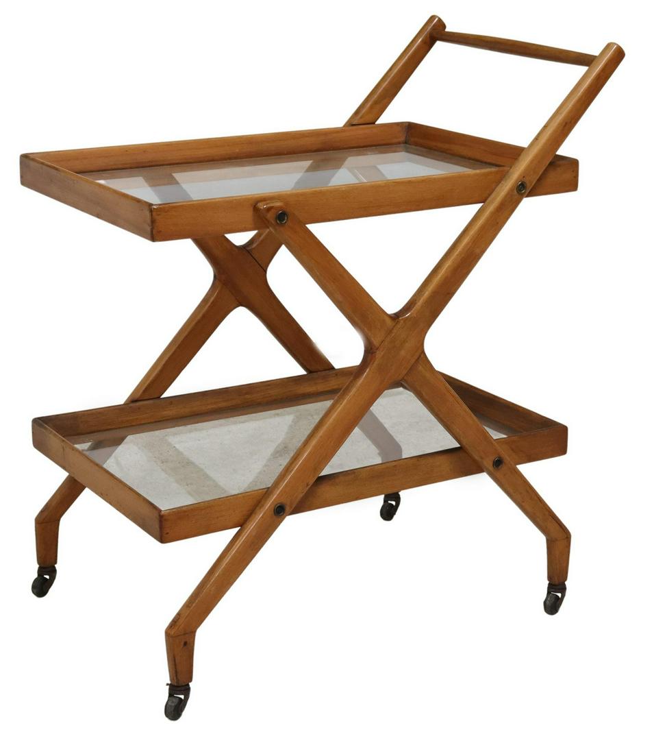 ITALIAN MID-CENTURY MODERN GLASS & WOOD BAR CART: Italian mid-century modern bar cart/ service trolley, c.1950s, having two rectangular colorless glass tiers, rising on crossed wood frame, with protruding side handle, ending on casters, approx 29"h, 