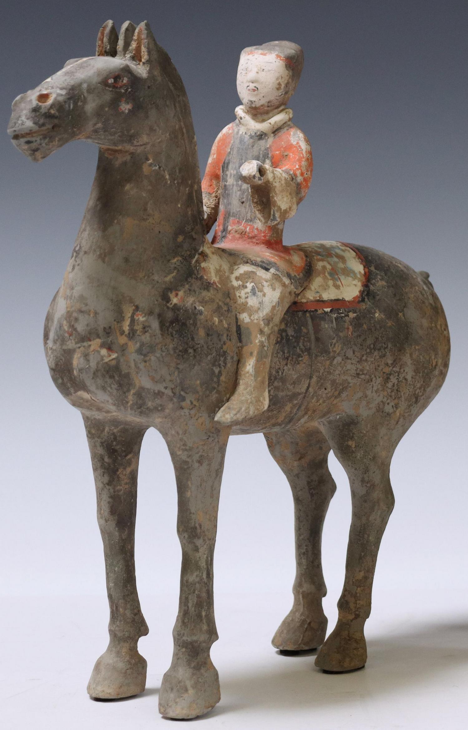 HAN DYNASTY WARRIOR ON HORSE TOMB FIGURE (TL'D): Han Dynasty earthenware tomb figure, warrior on standing horse, remnants of pigment, approx 12 3/8"h, 11"w, 4.25"d, 4lbs ** **Pending Thermoluminescence (TL) by Artemis Galleries,Co.** **Provenance: A