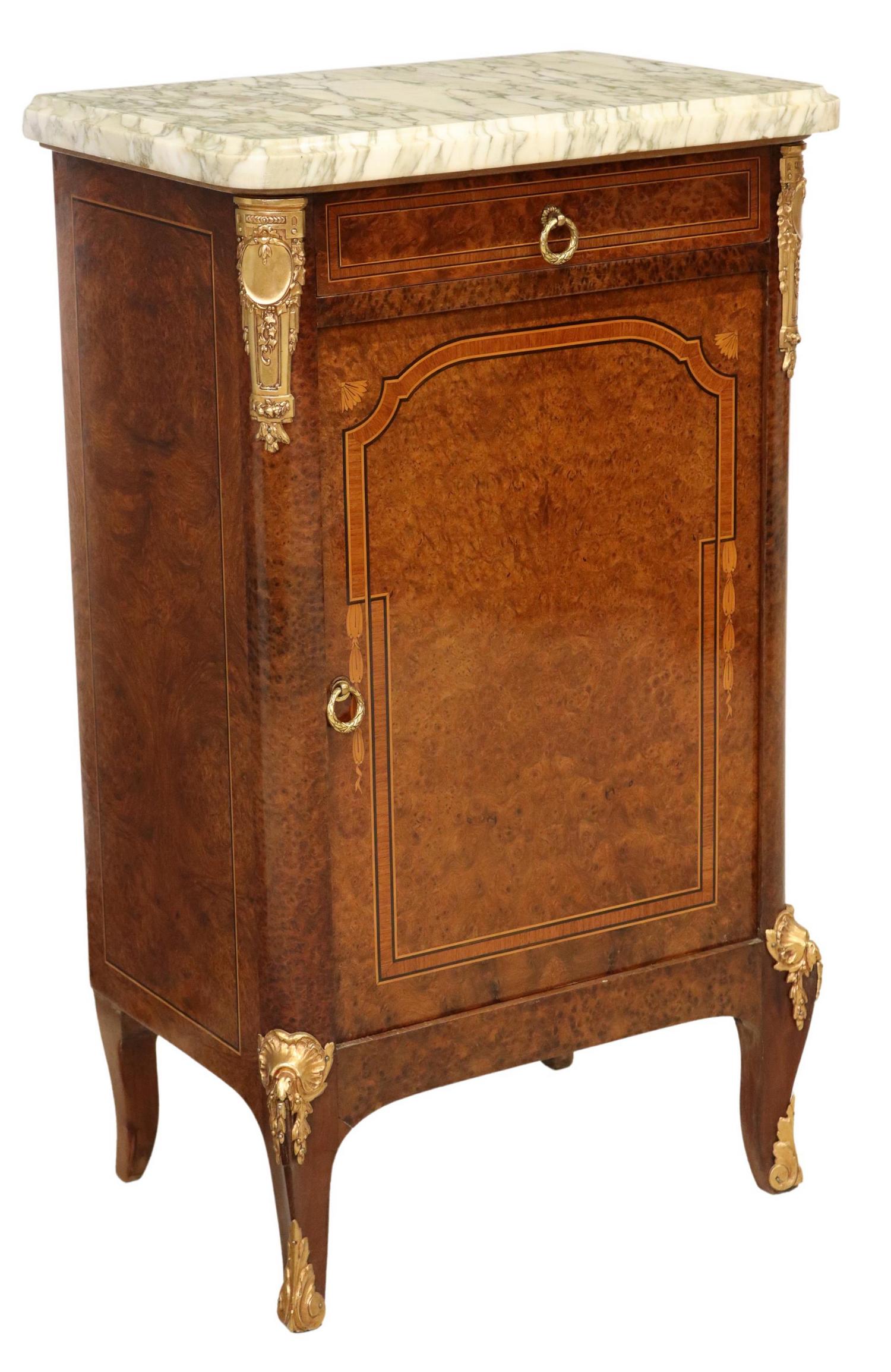 FRENCH MARBLE-TOP BURLWOOD BEDSIDE CABINET: French marble-top burlwood nightstand, early 20th c., banded drawer over cabinet door, interior marble shelf, rising on gilt metal sabots, approx 33"h, 19"w, 13.75"d Start Price: $300.00