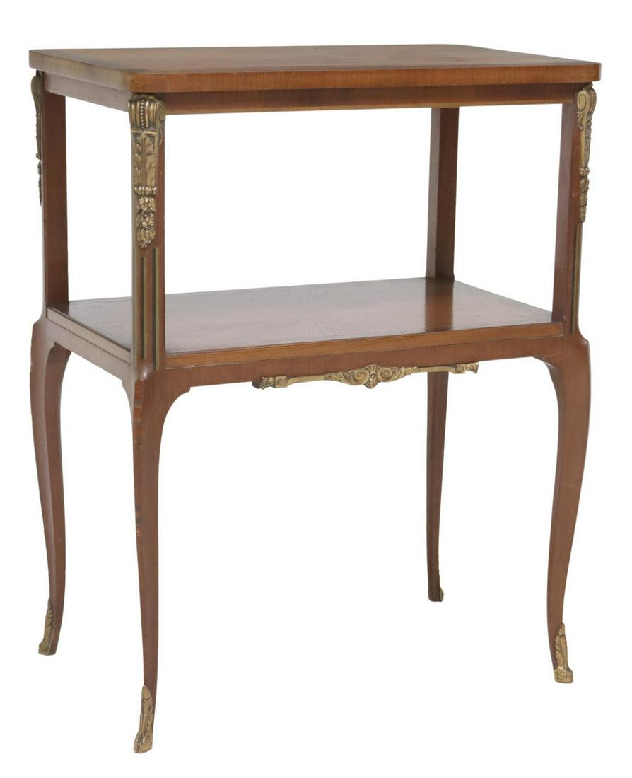 FRENCH LOUIS XV STYLE MATCHED VENEER TEA TABLE: French Louis XV style tiered tea table, 20th c., having matched veneer tops, with inlaid banded trim, gilt metal mounts, rising on cabriole legs, ending on sabots, some veneer loss, approx 32.75"h, 25