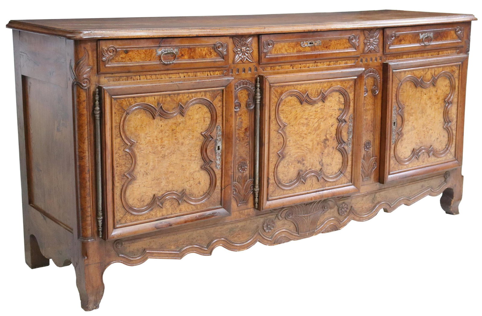 FRENCH LOUIS XV STYLE CARVED WALNUT SIDEBOARD: French Louis XV style walnut sideboard, early 19th c., three drawers, over three cabinet doors, all with burlwood panels, interior shelf, rising on cabriole legs, approx 39.75"h, 82.25"w, 24"d Start P