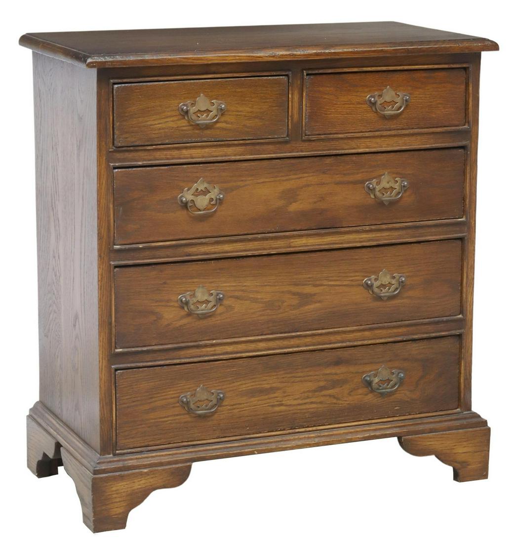 ENGLISH GEORGIAN STYLE OAK FIVE-DRAWER COMMODE: English Georgian style oak chest of drawers, 20th c., two half drawers, over three long drawers, rising on bracket feet, approx 31.5"h, 29.5"w, 15.25"d Start Price: $150.00