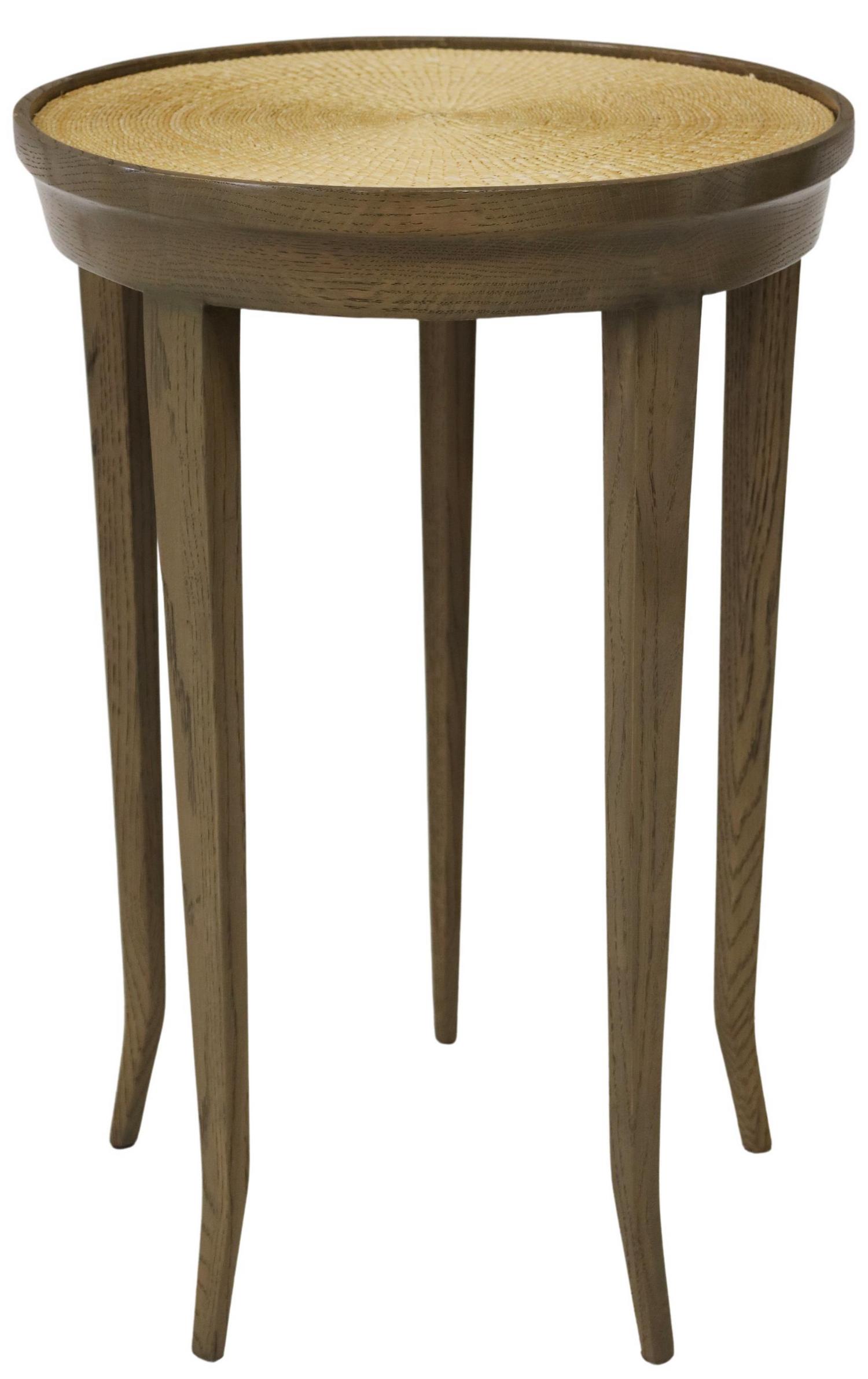 PAINTED WOOD & WICKER OCCASIONAL TABLE: Painted wood side table, having circular top with inset wicker design, rising on tapered square legs, approx 24.25"h, 15.75"diam**Provenance: An important Four Seasons, Austin, Texas penthouse estate*