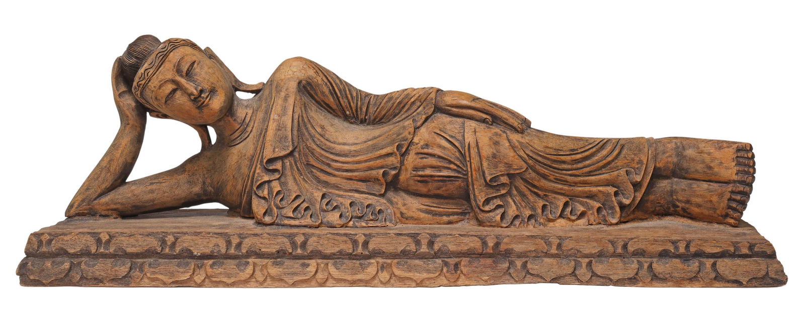 CARVED WOOD SCULPTURE RECLINING BUDDHA: Carved wood figure of the reclining Buddha, approx 7"h, 20.75"w, 5.75"d, 6.25lbs Start Price: $80.00