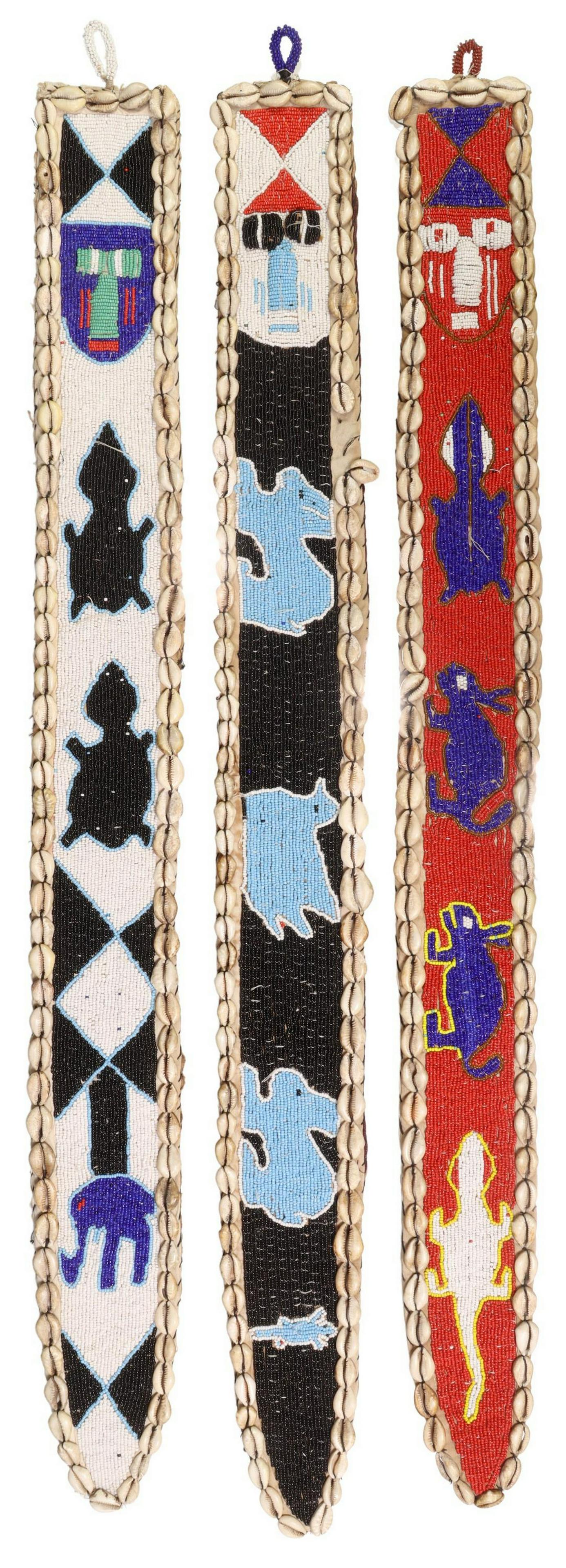 (3) AFRICAN BEADED & COWRIE SHELL WALL HANGINGS: (lot of 3) African beaded wall hangings, with various depictions of turtles, rabbits, each bordered by hand sewn on cowrie shells, some small losses, each approx 37"l, 3.5"w, 3.25lbs total Start Price