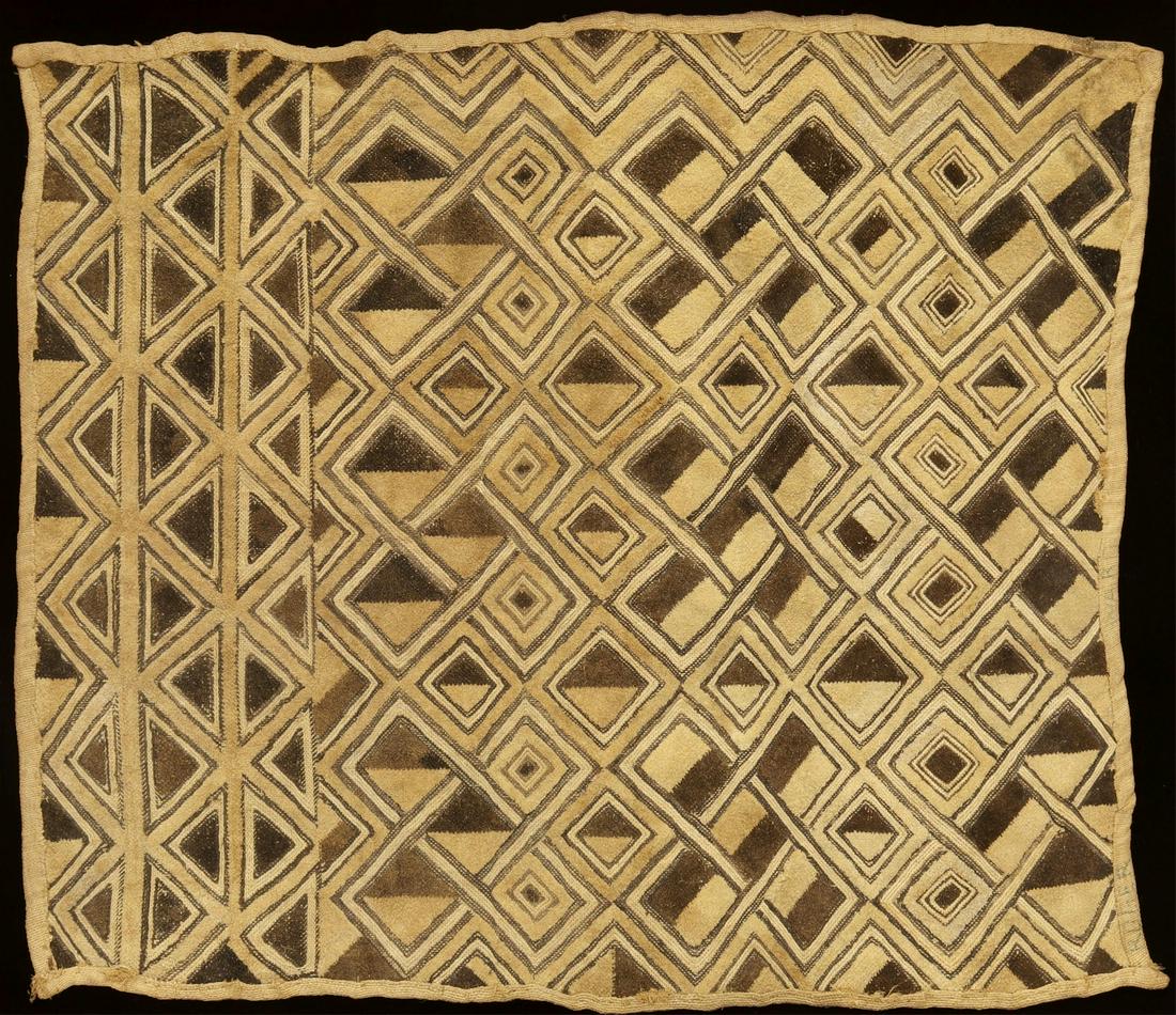 FRAMED AFRICAN KUBA CLOTH TEXTILE PANEL: Framed African Kuba cloth panel, textile: approx 21.25"h, 24.5"w, overall: 26.25"h, 29.5"w, 6.5lbs**Provenance: An important Four Seasons, Austin, Texas penthouse estate** Start Price: $80.00