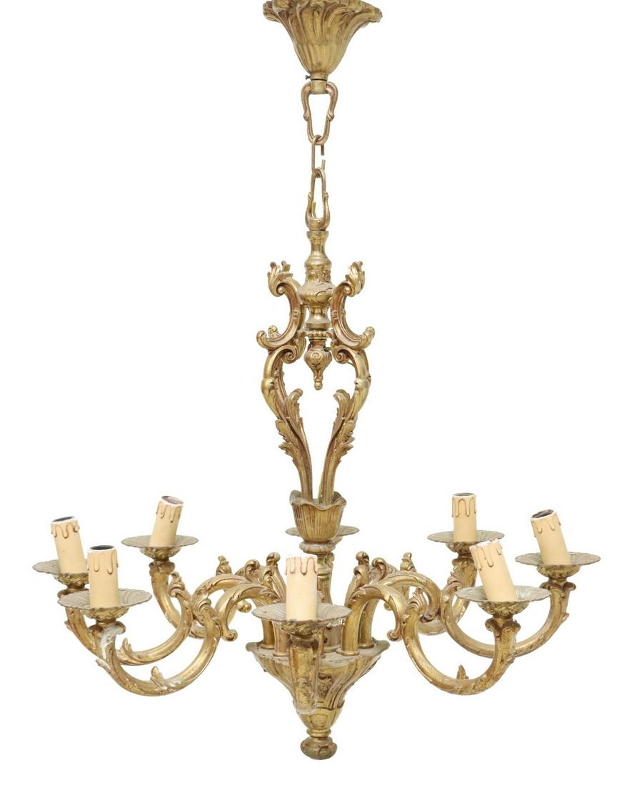 FRENCH LOUIS XV STYLE BRONZE 8-LIGHT CHANDELIER: French Louis XV style bronze eight-light chandelier, early 20th c., having scrolled foliate frame, issuing eight scrolled arms, ending on floral bobeches and faux candles, in need of wiring, approx 31