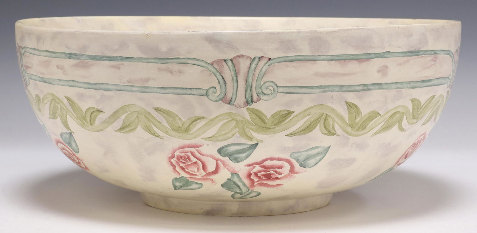 MAITLAND-SMITH HAND-PAINTED CERAMIC BOWL: Hand-painted ceramic bowl, Maitland-Smith, late 20th c., wide form, painted in roses and foliates, some small losses to paint, approx 5.75"h, 14 1/8"diam, 7.5lbs **Provenance: From an important Guadal