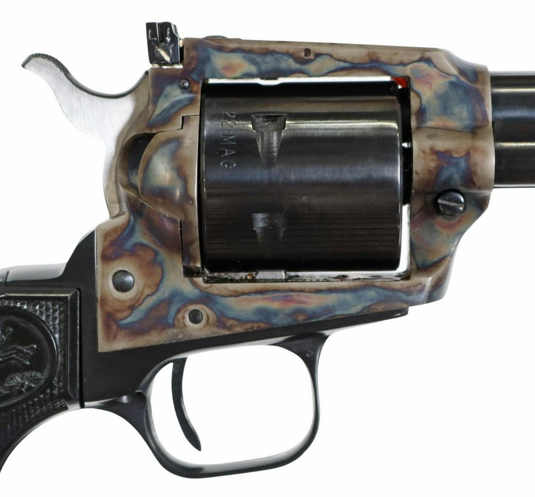 COLT NEW FRONTIER SAA REVOLVER, .22 MAG CALIBER: Colt New Frontier Revolver, single action, mfg. 1976, .22 Mag caliber, 4.25" barrel, with ramp front sight, adjustable rear sight, marked at the barrel left "New Frontier .22", case hardened frame mar