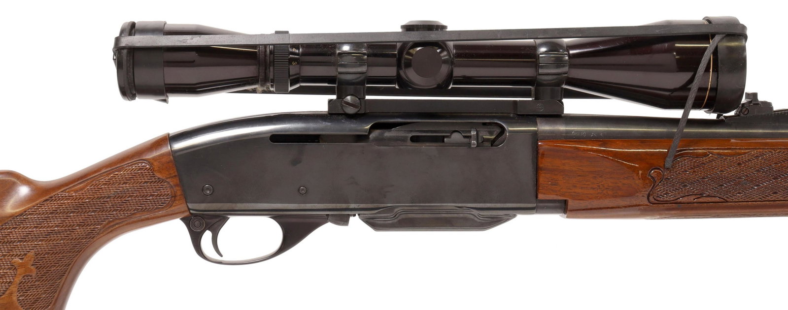 REMINGTON MODEL 742 WOODMASTER, .30-06 CALIBER: Remington Model 742 Woodmaster rifle, auto load, .30-06 Sprg caliber, 22" barrel, fixed front white dot sight, adjustable rear sight, mounted Leupold 3 x 9 scope, detachable 4 round magazine, gloss ch