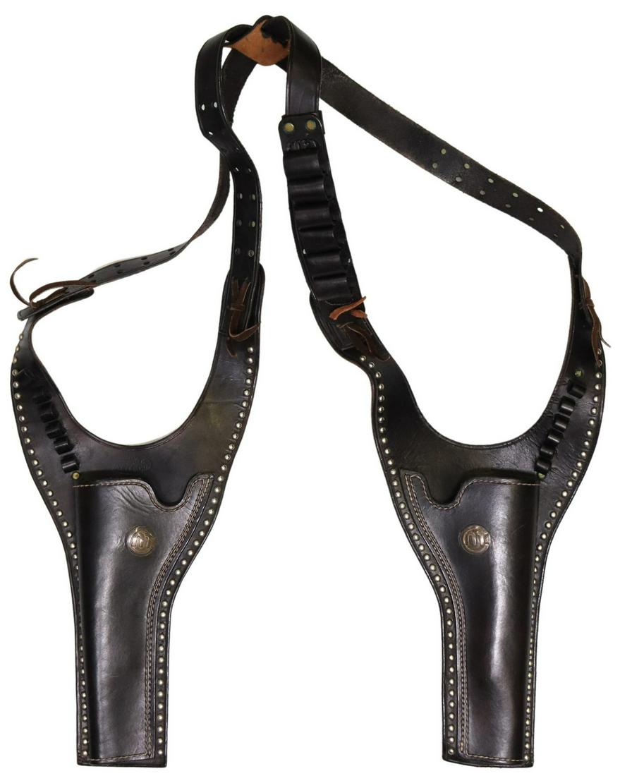 JOHN DAY TEXAS STUDDED LEATHER SHOULDER HOLSTERS: Western stitched leather shoulder holsters, John Day Cattle Company, Texas, studded accents, fitted with eighteen cartridges in varied sizes, having silver-tone MC brand for Mike Cook, some wear and p