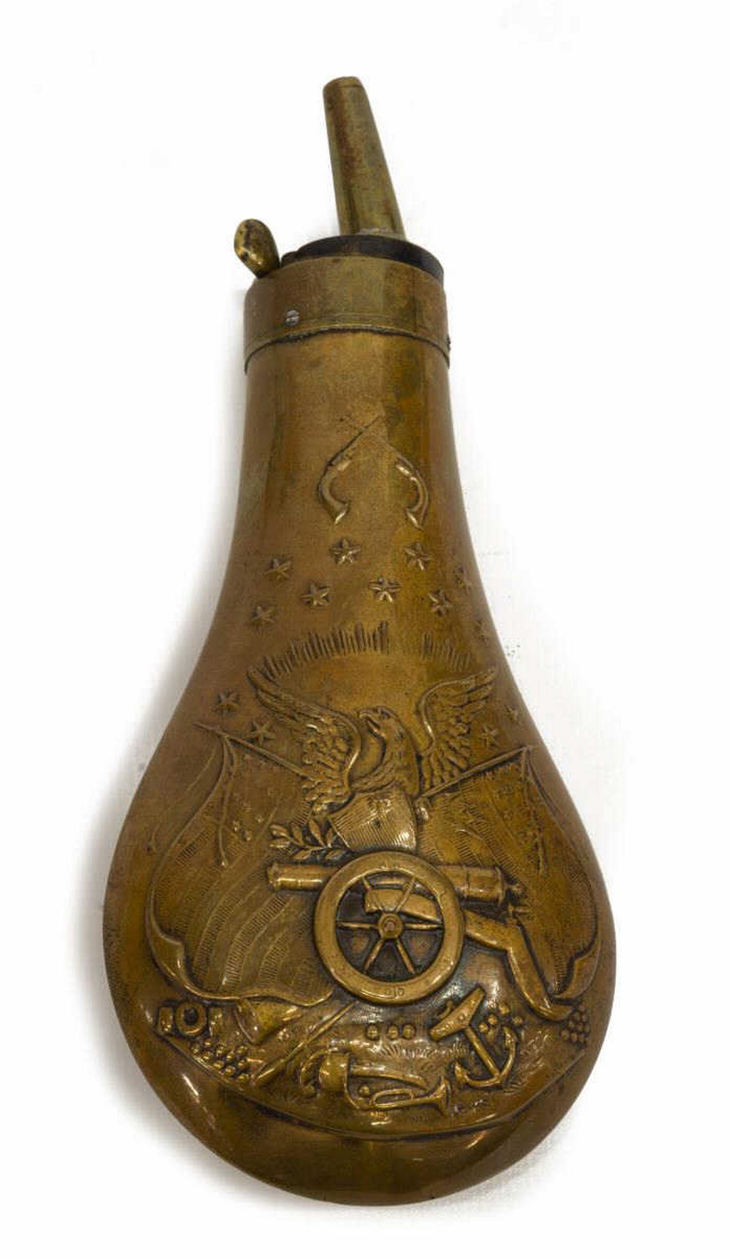 COLT NAVY EMBOSSED POWDER FLASK: Colt Navy embossed powder flask, c.1851-1861, two sides depicting two pistols above stars, an eagle with shield in front of flags, a cannon, anchor, bugle and more, angled spout, 5" base to top, appro