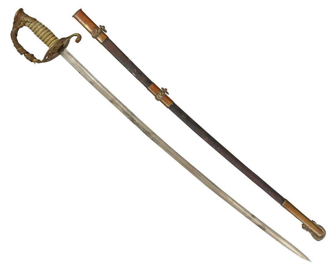 SCARCE CALIFORNIA NAVAL MILITIA SWORD EARLY 20th C: Sword, believed to be a California Naval Militia National Guard Sword, early 20th c., the 30" foliate engraved slightly curved blade further embellished with flags, the U.S. shield, anchor and one sid