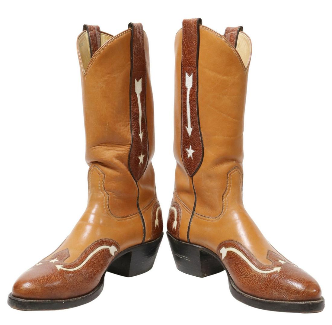 (PR) WHEELER BOOT CO. CUSTOM WINGTIP COWBOY BOOTS: (pair) Custom-made wingtip cowboy boots, no tag, likely Wheeler Boot Company, Houston, Texas, multi-leather boot with stitched shaft, star and arrow design, heel with wear, accompanied by Wheeler wood