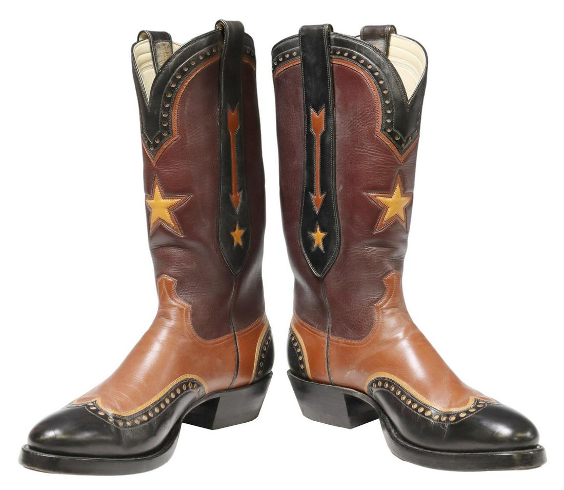 (PR) WHEELER BOOT CO. CUSTOM WINGTIP COWBOY BOOTS: (pair) Custom-made wingtip cowboy boots, Wheeler Boot Company, Houston, Texas, multi-leather boot with stitched shaft, star and arrow design, heel with wear, accompanied by Wheeler wood boot trees, si
