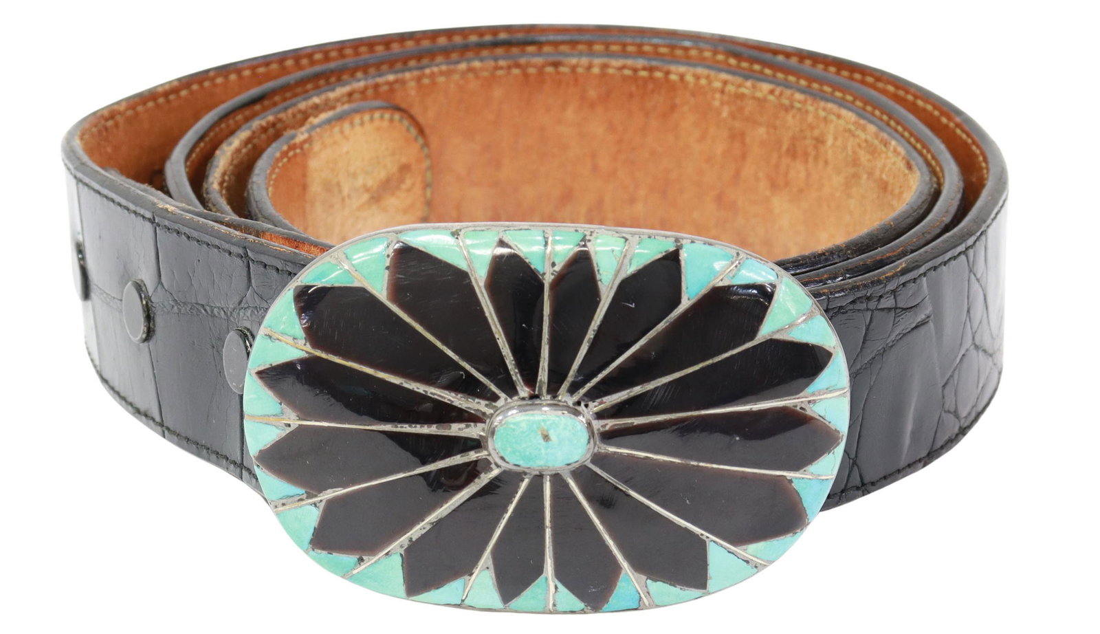 NATIVE AMERICAN ZUNI INLAID SILVER BUCKLE & BELT: Native American silver (content unknown) belt buckle, signed RB Zuni, oval form, inlaid with turquoise and possibly horn, on a black Falconhead leather belt, in crocodile or alligator, belt marked siz