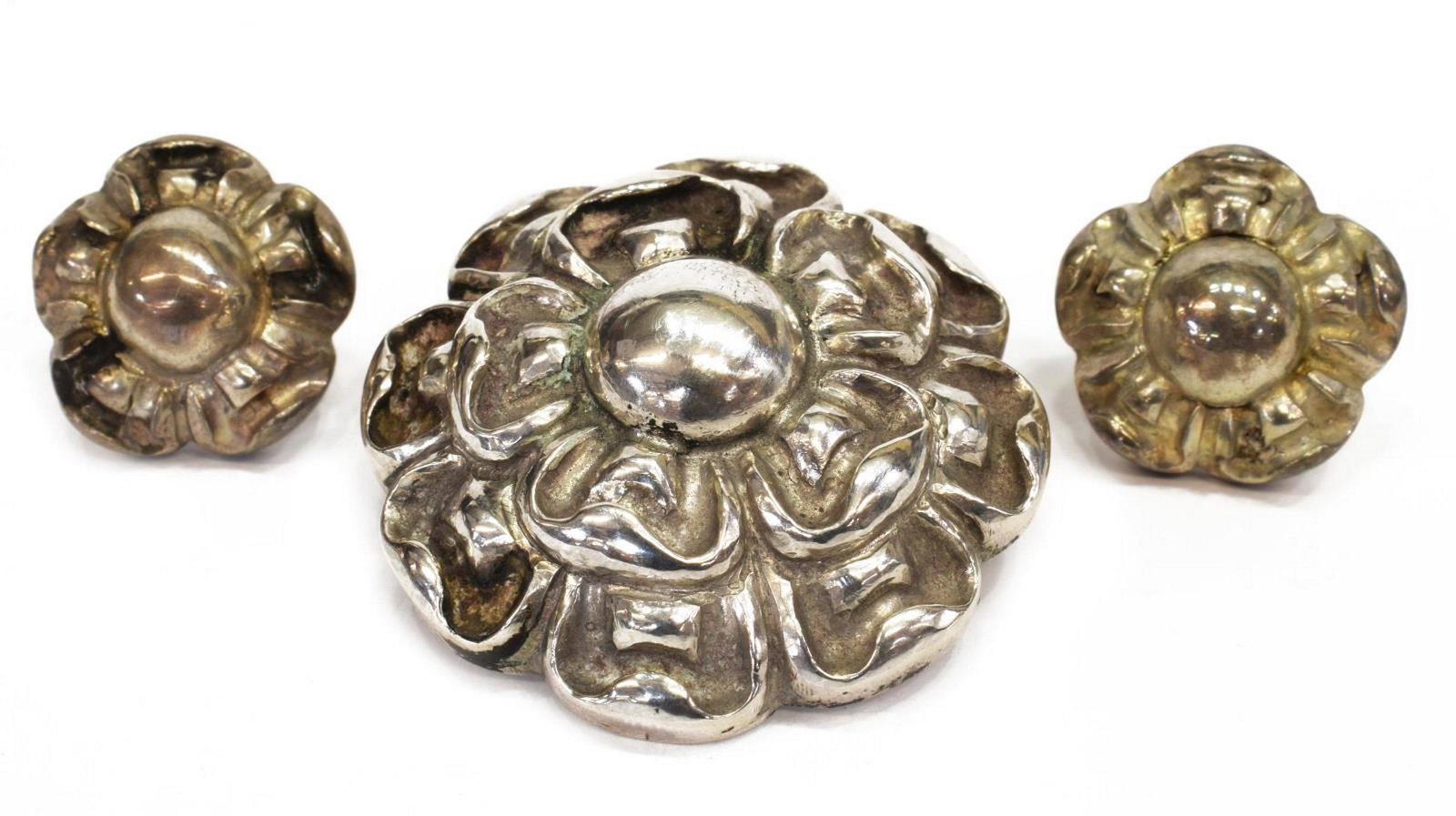 (2) MATILDE POULAT (D.1960) FLORAL PIN & EARRINGS: (lot of 2) Silver (content unknown) jewelry, including: (1) floral brooch, signed Matl (Matilde Poulat, Mexico, d.1960), approx 1.5"diam, (pair) floral earrings, possibly converted to post for pierced