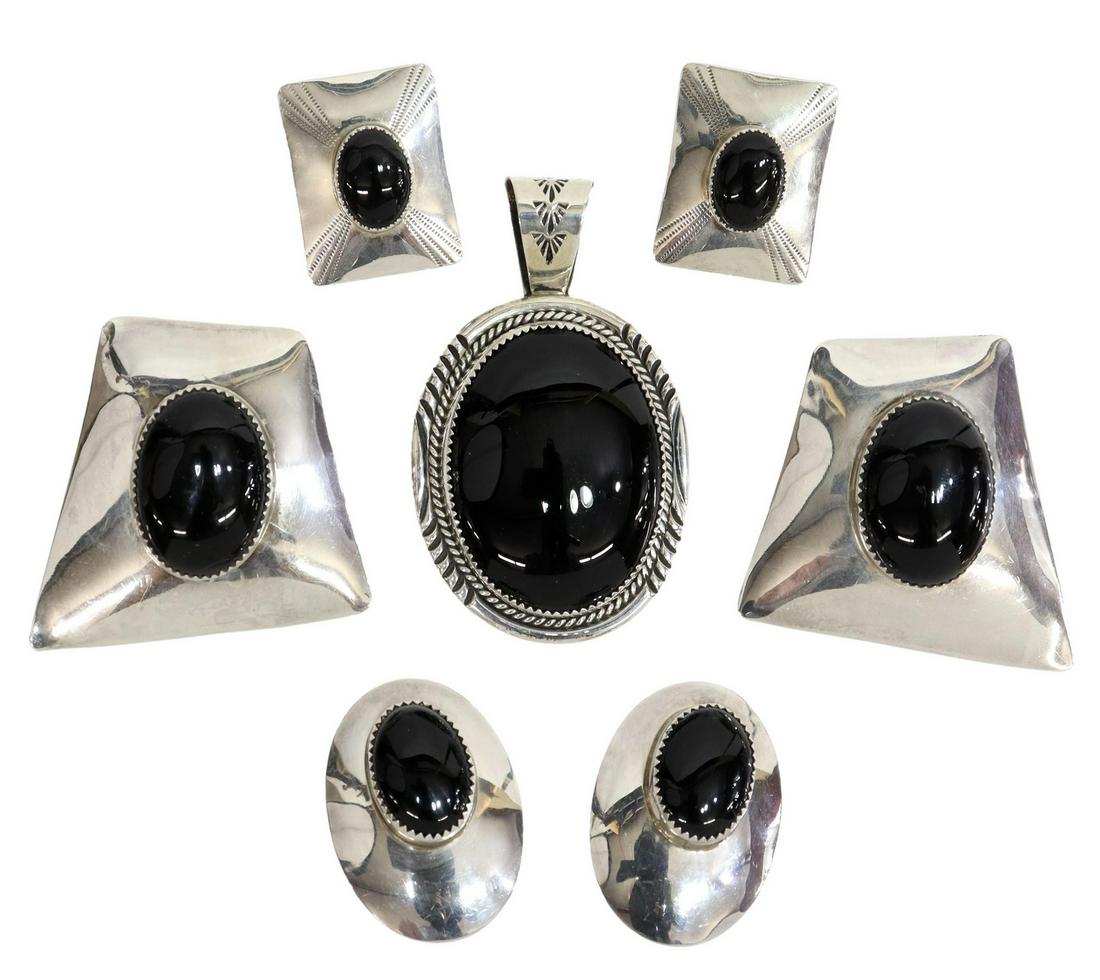 LOT) NATIVE AMERICAN & OTHER STERLING ONYX JEWELRY: (lot) Native American and other sterling silver and onyx cabochon jewelry, including: (pair) large trapezoidal earrings, marked FY (Foster Yazzie, Navajo/ Dine, 20th c.), IHMSS (Indian hand-made sterl