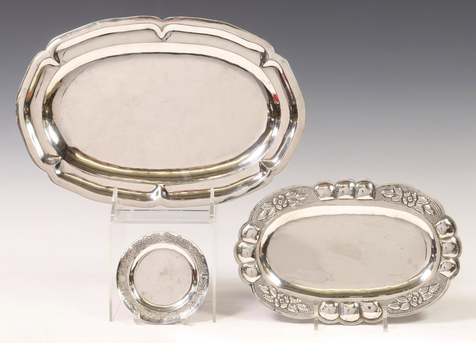 (3) SANBORNS & OTHER STERLING SILVER TRAYS, MEXICO: (lot of 3) Silver trays, Mexico, including: (1) sterling silver oval tray, Sanborns, with Baroque style edge, approx 11 1/8"l, 7 3/8"w, (1) sterling silver oval tray, with repousse edge, hallmarked 92