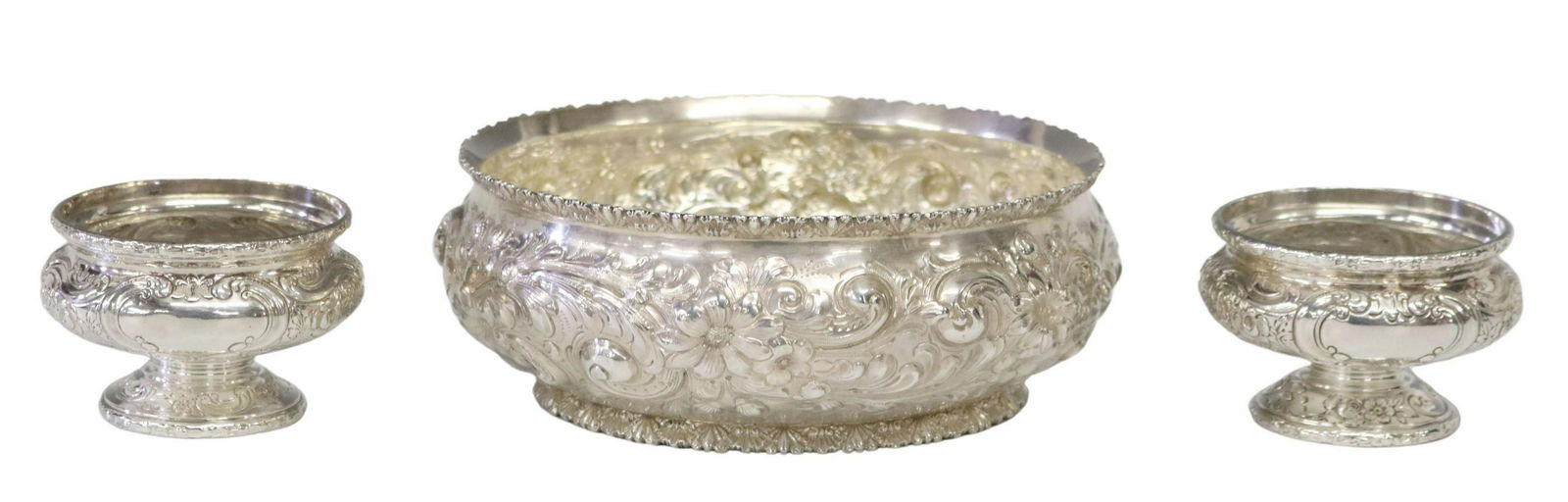 (3) AMERICAN STERLING SILVER BOWLS: (lot of 3) American sterling silver bowls, including: (1) William B. Durgin Company, retailed by Marsh & Hoffman, repousse floral and foliate scroll motifs, model 492, underside monogrammed and dated