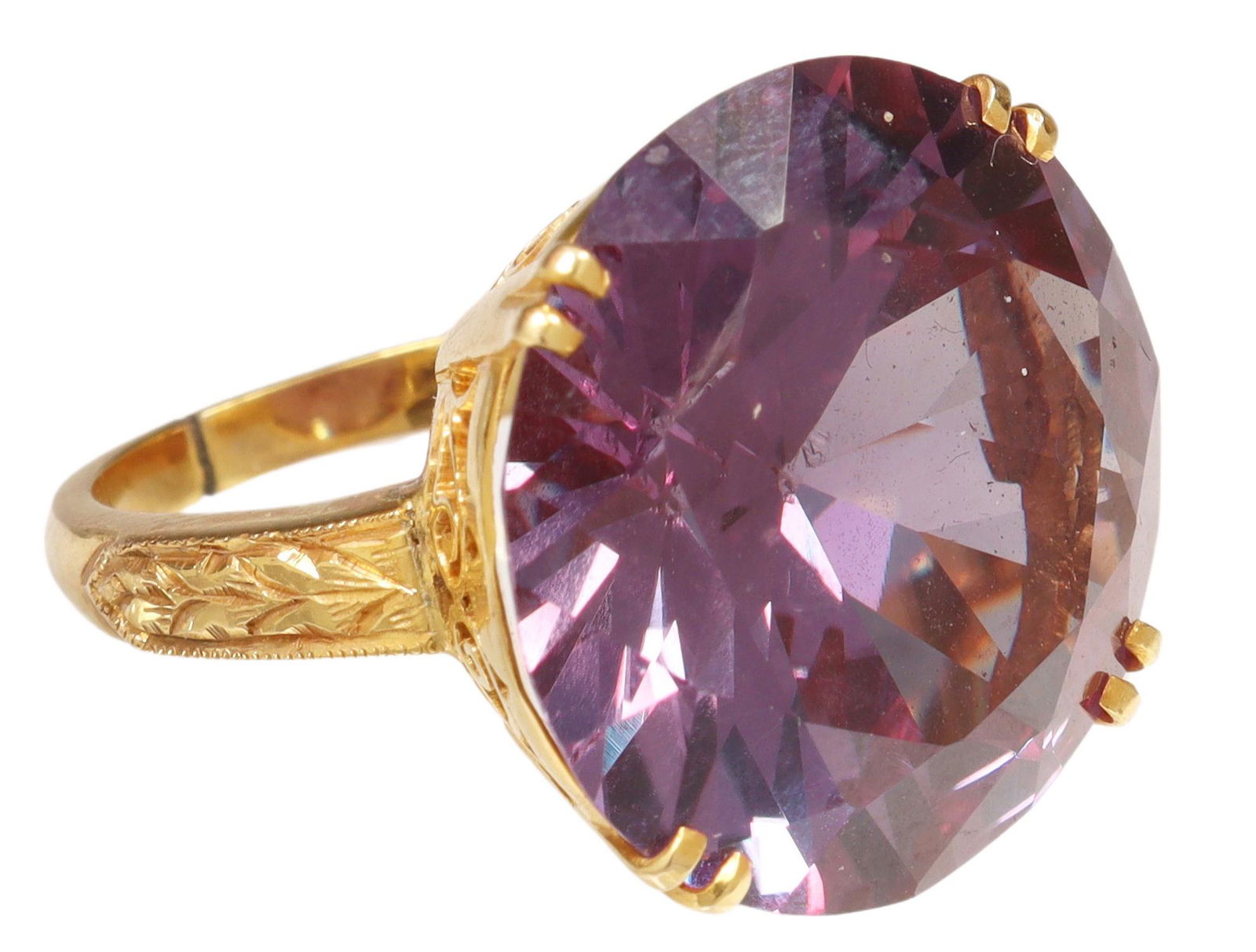 ESTATE GOLD & 30.00CT LAB ALEXANDRITE RING: Estate yellow gold ring, likely 10kt gold flashed with high carat gold (per EDXRF test), lab created color change sapphire (lab alexandrite), approx 30.00ct, split/ cut shank, approx size 5.5, 9.1 gra