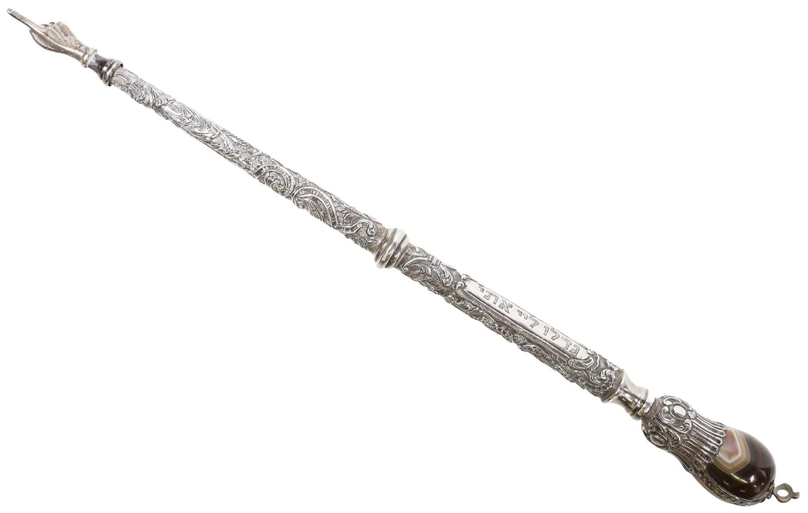 JUDAICA SILVER & AGATE YAD TORAH POINTER: Silver (content unknown) Yad (Torah pointer), repousse body with Rococo style scrolls, engraved cartouche, the end enclosing a banded agate stone, approx 15.25"l, 147.5 grams (inclusive of all materia