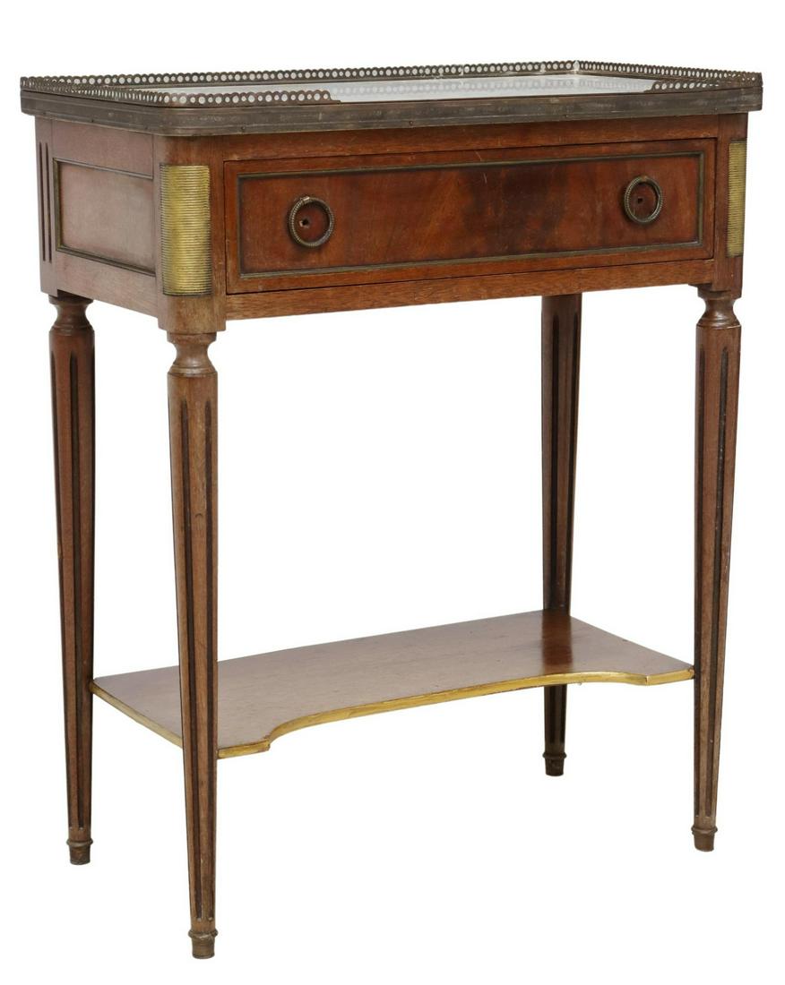 FRENCH LOUIS XVI STYLE MAHOGANY SIDE TABLE: French Louis XVI mahogany side table, 20th c., having inset marble top, with pierced metal gallery, single drawer, over medial shelf stretcher, rising on fluted tapered legs, approx 27.25"h, 21 7/8"w,
