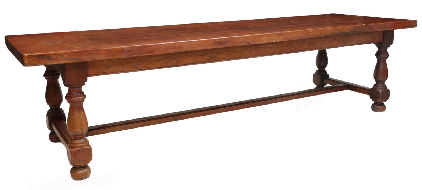 FRENCH PROVINCIAL FARMHOUSE TABLE, 118.5"L: French Provincial farmhouse table, 20th c., overhanging rectangular top, rising on turned baluster-form legs, joined by H stretcher, ending in bun feet, approx 29.75"h, 118.5"l, 37"w, bottom of apron 