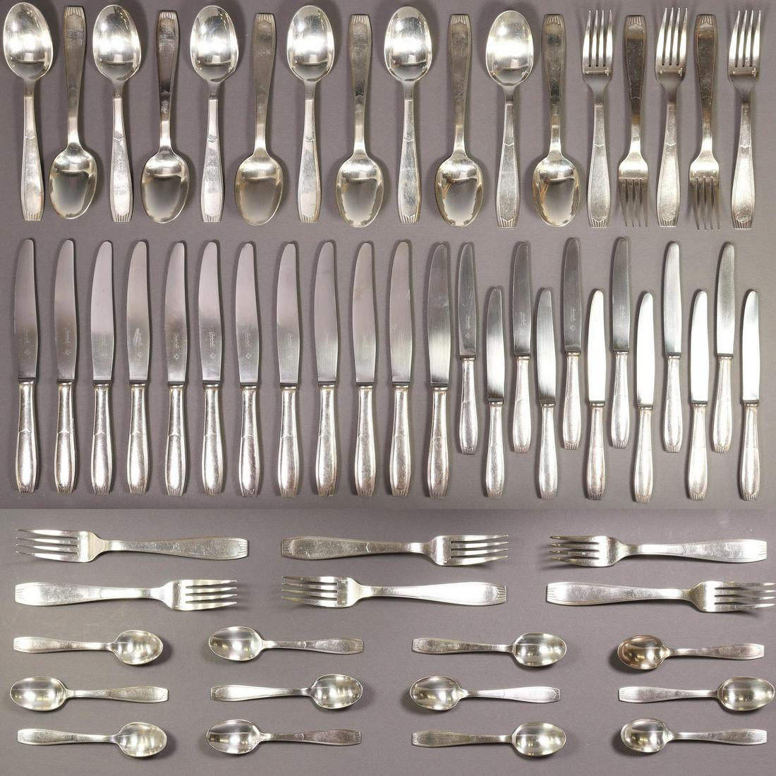 (59) CHRISTOFLE 'SAIGON' SILVERPLATE FLATWARE SET: (lot of 59) French silverplate flatware service, Orfevrerie Christofle, in the "Saigon" pattern, including: (12) hollow handle knives, 9 5/8"l, (12) hollow handle knives, 8"l, (11) forks, 8 1/8"l, (12