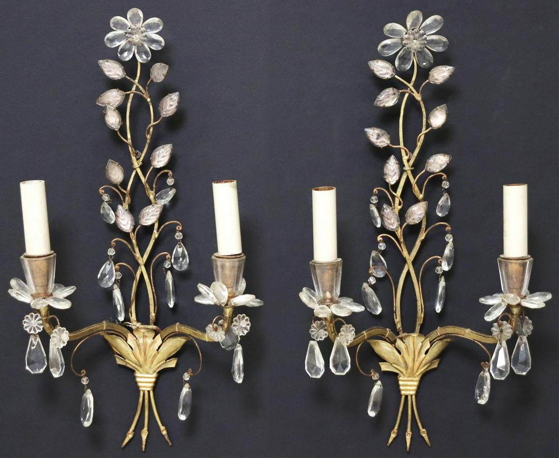 (2) MAISON BAGUES STYLE CRYSTAL WALL SCONCES: (pair) Gilt metal and crystal two-light wall sconces, in the manner of Maison Bagues, 20th c., trailing foliate back plate, issuing floral bobeches, hung with drops, in need of wiring, approx 18"h, 10