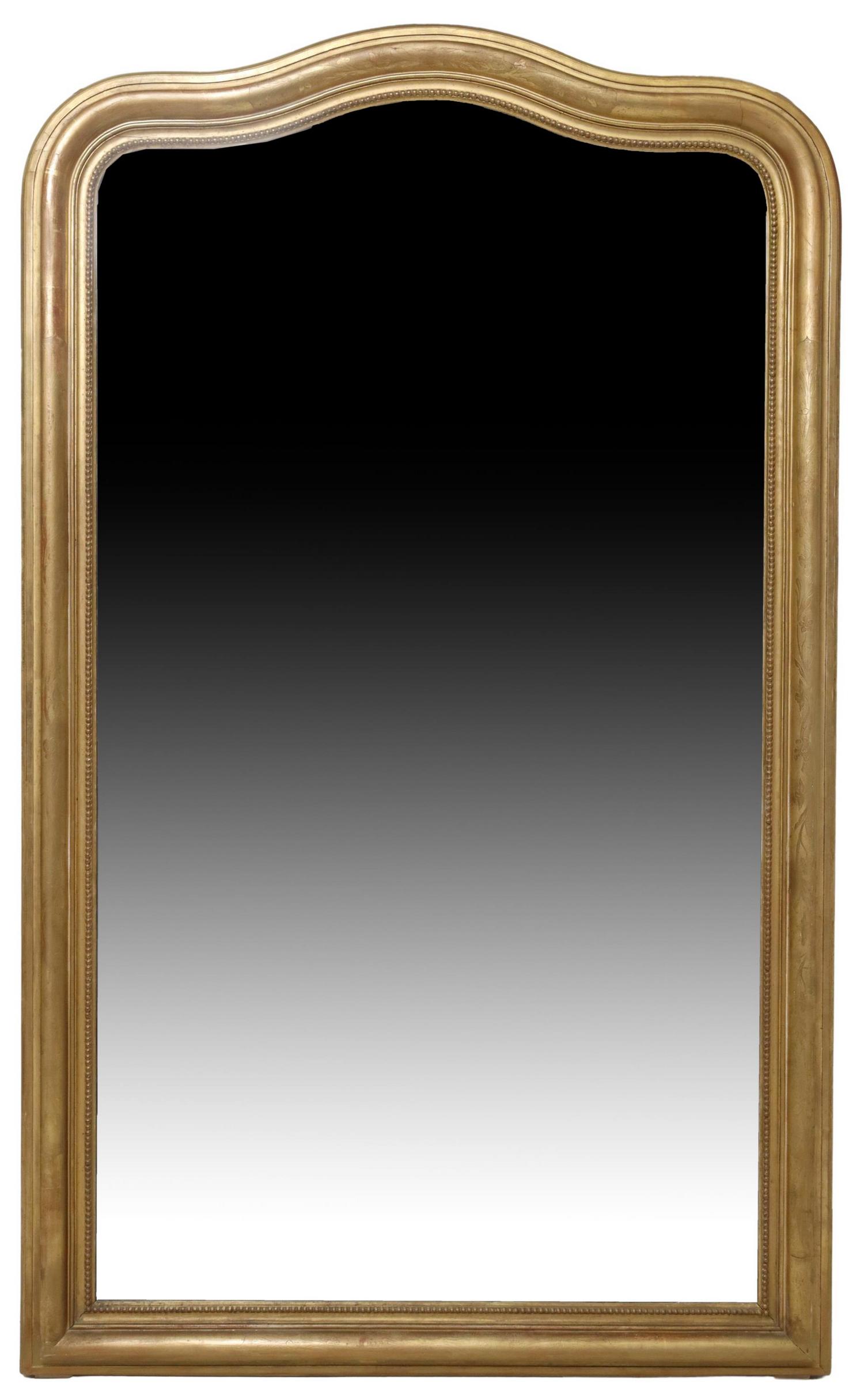 FRENCH LOUIS PHILIPPE PERIOD GILT WALL MIRROR: French Louis Philippe period wall mirror, mid 19th c., in a later painted gilt finish, having shaped frame, with incised floral motifs, beaded trim, encasing flat mirror plate, approx 77"h, 47"w, 120l