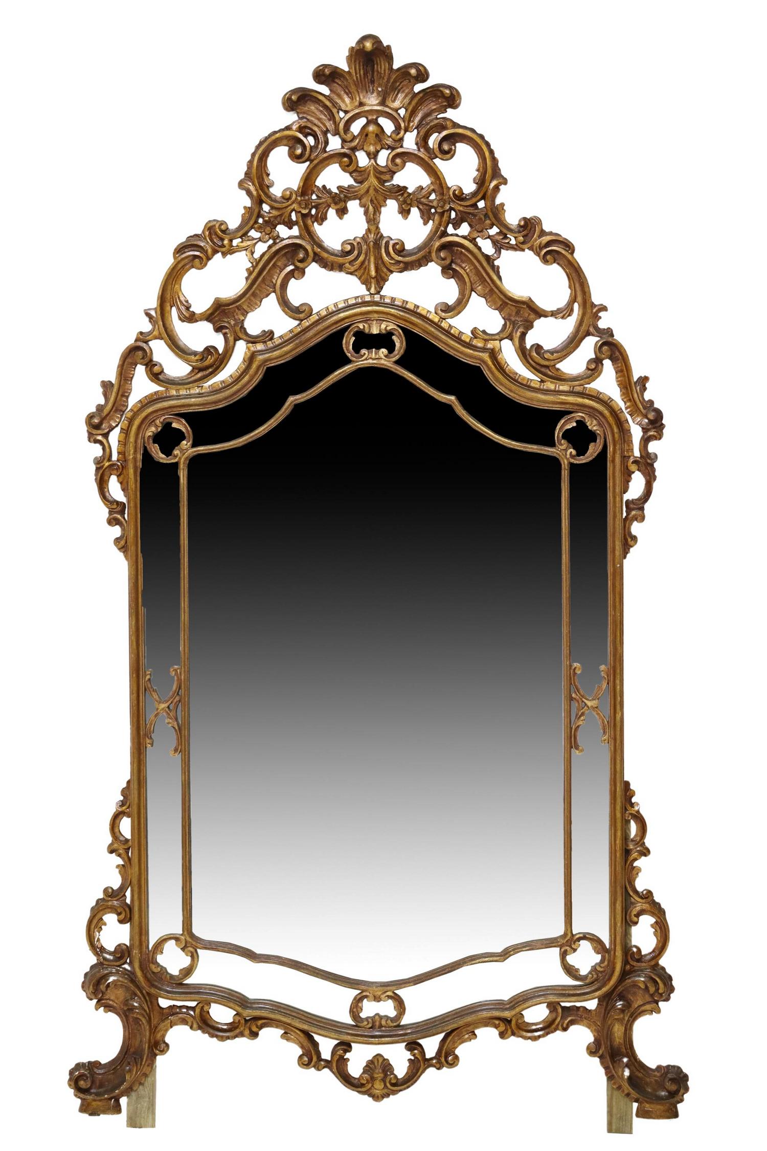 ITALIAN LOUIS XV STYLE GILT PAINTED CUSHION MIRROR: Italian Louis XV style cushion wall mirror, early 20th c., in a painted gilt finish, having fanned crest with scrolled foliates and floral motifs, over cushion frame, encasing flat mirror plate, glue 