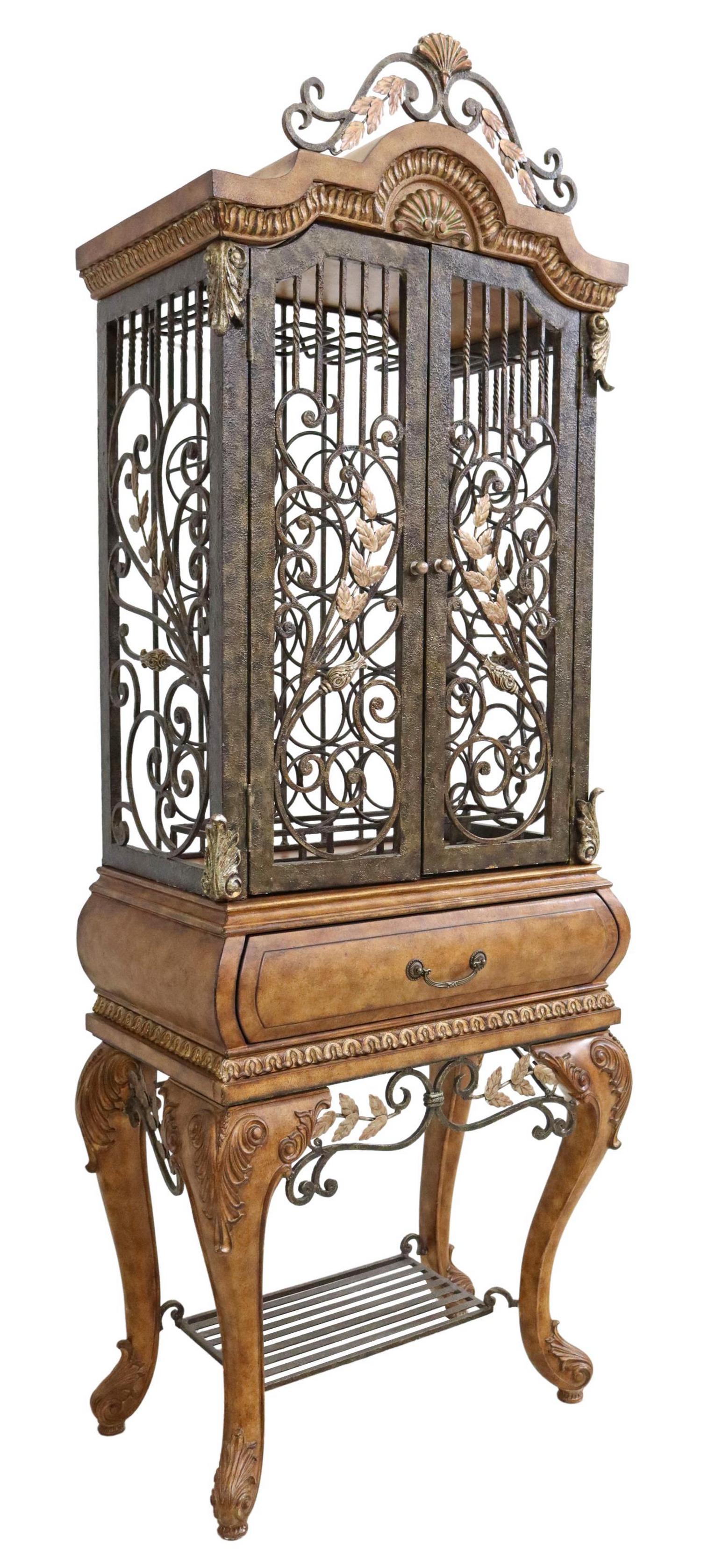 MAITLAND-SMITH (ATTR.) PAINTED IRON WINE CABINET: Louis XV style wine cabinet, attributed to Maitland-Smith, late 20th c., having scrolling foliate crest, over painted iron case, fitted with twenty-five bottle rack, single drawer, over medial shelf,