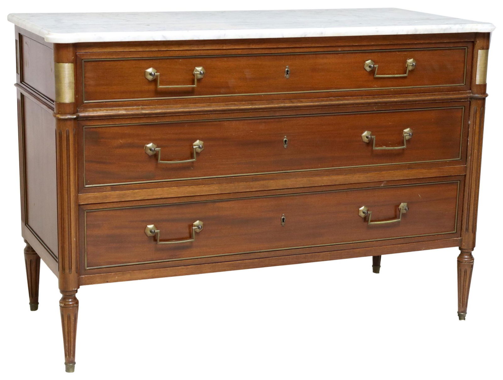 FRENCH LOUIS XVI STYLE MAHOGANY MARBLE-TOP COMMODE: French Louis XVI style mahogany commode, early 20th c., having shaped marble top, over three drawers, with gilt metal banding, rising on fluted and tapered legs, approx 32.25"h, 47"w, 20.75"d Start Pr