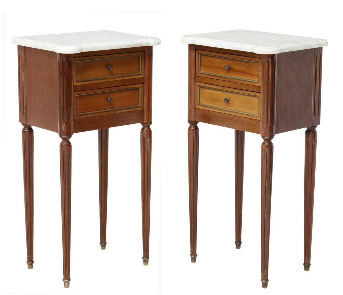 (2) FRENCH LOUIS XVI STYLE MARBLE-TOP NIGHTSTANDS: (pair) French Louis XVI style marble-top mahogany nightstands, 20th c., two drawers, rising on tapering fluted legs, approx 28"h, 14.5"w, 10.75"d Start Price: $150.00