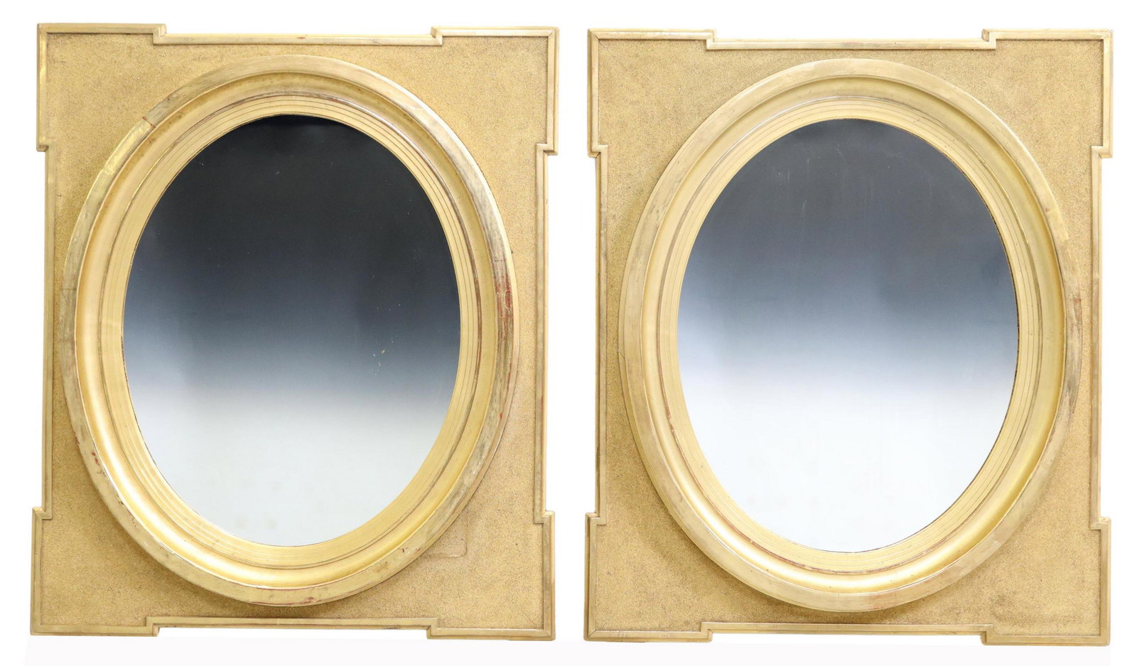 (2) FRENCH GILTWOOD & TEXTURED WALL MIRRORS: (pair) French giltwood and gilt painted wall mirrors, 20th c., having shaped frame with textured ground, centering molded oval frame, encasing flat mirror plate, approx 31"h, 25"w; 25lbs total Start P