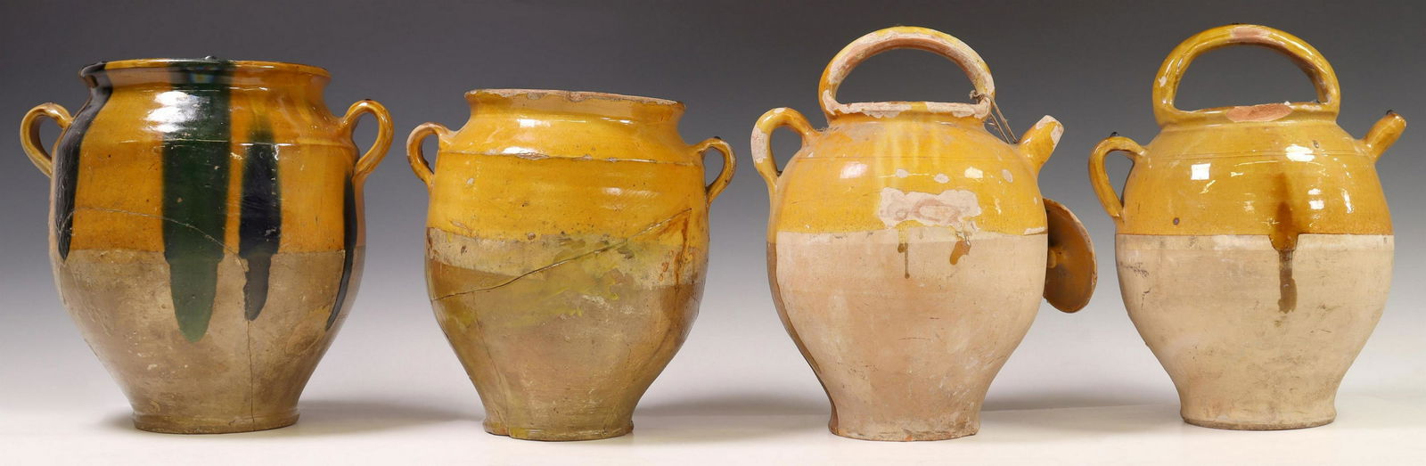 (4) FRENCH EARTHENWARE CRUCHES & CONFIT POTS: (lot of 4) French Provincial earthenware vessels, with ochre-colored glazed rim, typical glaze losses, small chips, including: (2) water jugs, tallest: approx 13.75"h, (2) confit pots, (one) with gree