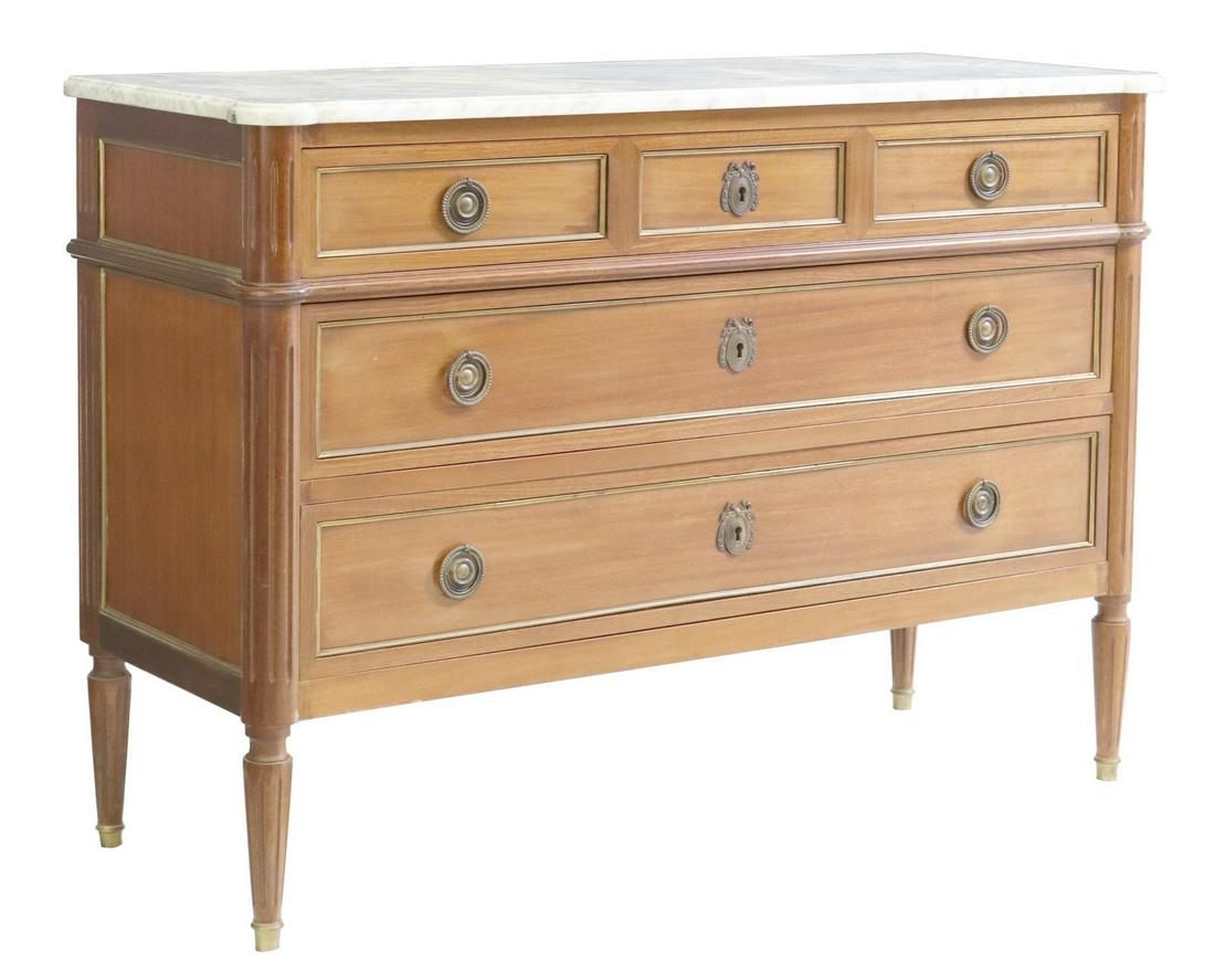 FRENCH LOUIS XVI STYLE MARBLE-TOP MAHOGANY COMMODE: French Louis XVI style marble-top mahogany commode, 20th c., fitted with three drawers, flanked by fluted corner posts, rising on tapered legs, approx 33"h, 47.5"w, 17.25"d Start Price: $400.00