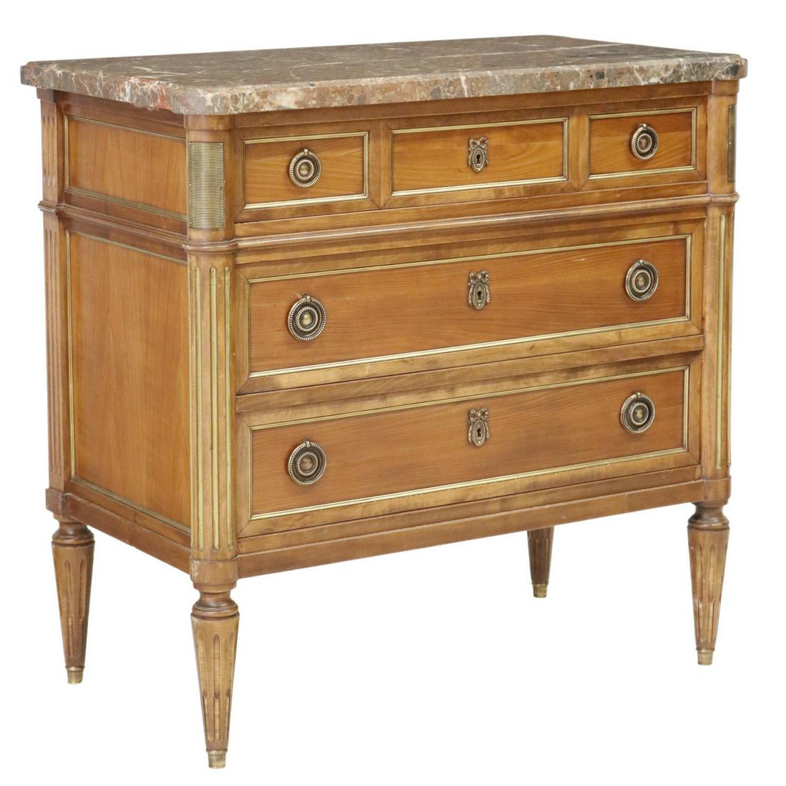 FRENCH LOUIS XVI STYLE MAHOGANY MARBLE-TOP COMMODE: French Louis XVI style mahogany commode, late 19th c., having shaped marble top, over three drawers, with gilt metal banding, rising on fluted and tapered legs, approx 34.25"h, 35"w, 19"d Start Price: