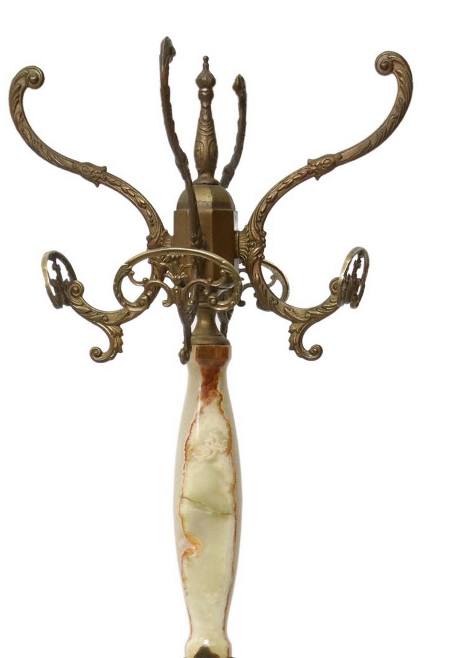 ITALIAN PATINATED METAL & ONYX HALL TREE: Italian onyx and patinated metal hall tree, 20th c., having four scrolling foliate hooks, rising on turned-form onyx standard, ending on tripodal caryatid legs, approx 70.5"h, 18.25"diam Start Price: 