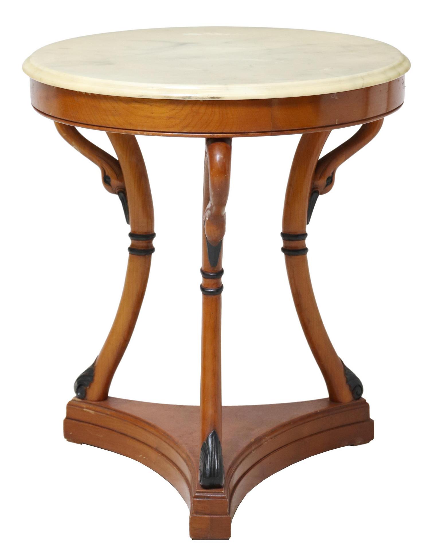 FRENCH EMPIRE STYLE MARBLE TOP SWAN LEG GUERIDON: French Empire style occasional table, 20th c., having round marble top, over parcel ebonized swan leg supports, joined with pedestal base, approx 26.25"h, 23.25"diam Start Price: $150.00