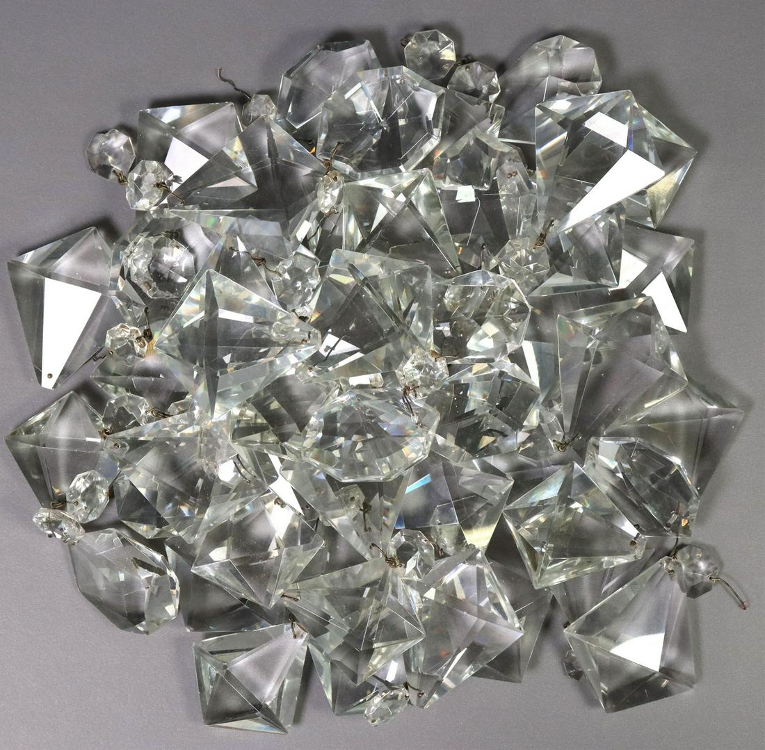 (LOT) CRYSTAL CHANDELIER PRISM DROPS: (lot) Crystal chandelier prisms, parts and pieces, typical small chips, largest: approx 3"h, 3"w, 12.5lbs total Start Price: $80.00