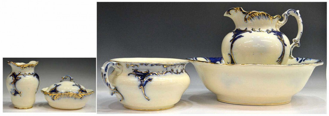 CONTINENTAL PARCEL GILT FLOW BLUE WASH BASIN SET: (set of 5) Continental flow blue wash set with parcel gilding, all marked 101 underfoot, comprising: (1) pitcher, 11"h, 10.5"diam; (1) chamber pot, 5.5"h, 11"diam; (1) reservoir bowl, 5.25"h, 18"diam;
