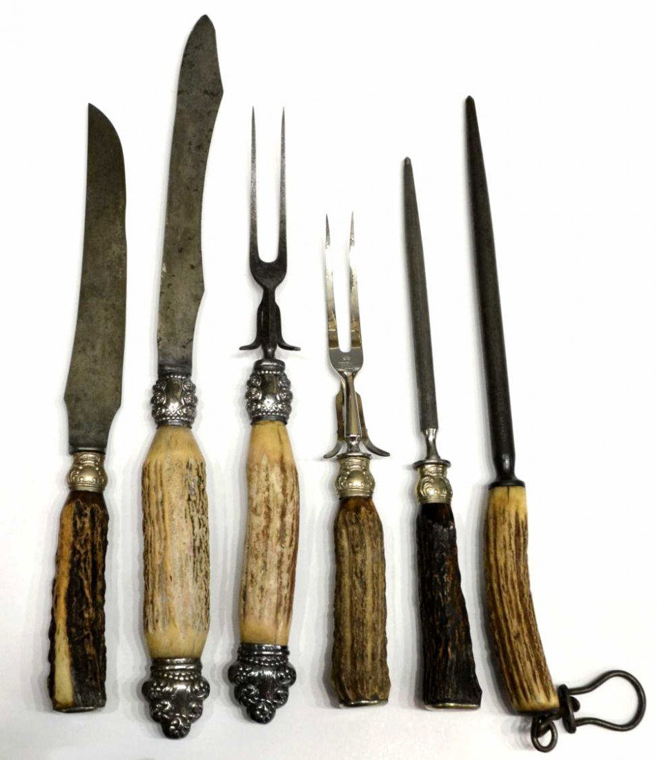 19TH / 20TH C. STAG HANDED CARVING SETS, GERMANY: (lot of 6) Stag handled carving sets, late 19th/early 20th c., including: a large two-piece set with repousse silver collars and end pieces, largest: 16.5"l; a German three-piece set with knife, fork 