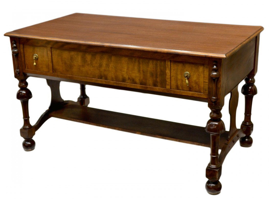WALNUT DESK OR TABLE CONVERTING TO BED, 1930's: Walnut finish or desk by United Table Company, Chicago, 1930's, rectangular form with faux drawer front lifting to reveal fold out bed, set on turned bell legs with ball feet, 30,75"h, 54"w, 29.75"d S