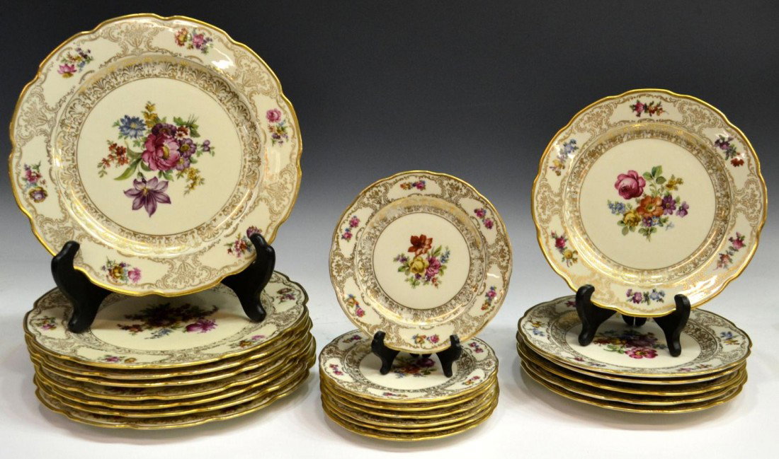 SCHUMANN BAVARIA PORCELAIN PART DINNER SERVICE: (lot of 21) Schumann Dressdner Art China plates, '18557,' polychrome floral pattern with delicate parcel gilt details, comprising: (8) dinner plates, 10"diam; (6) luncheon plates, 8.5"diam; (7) bread 