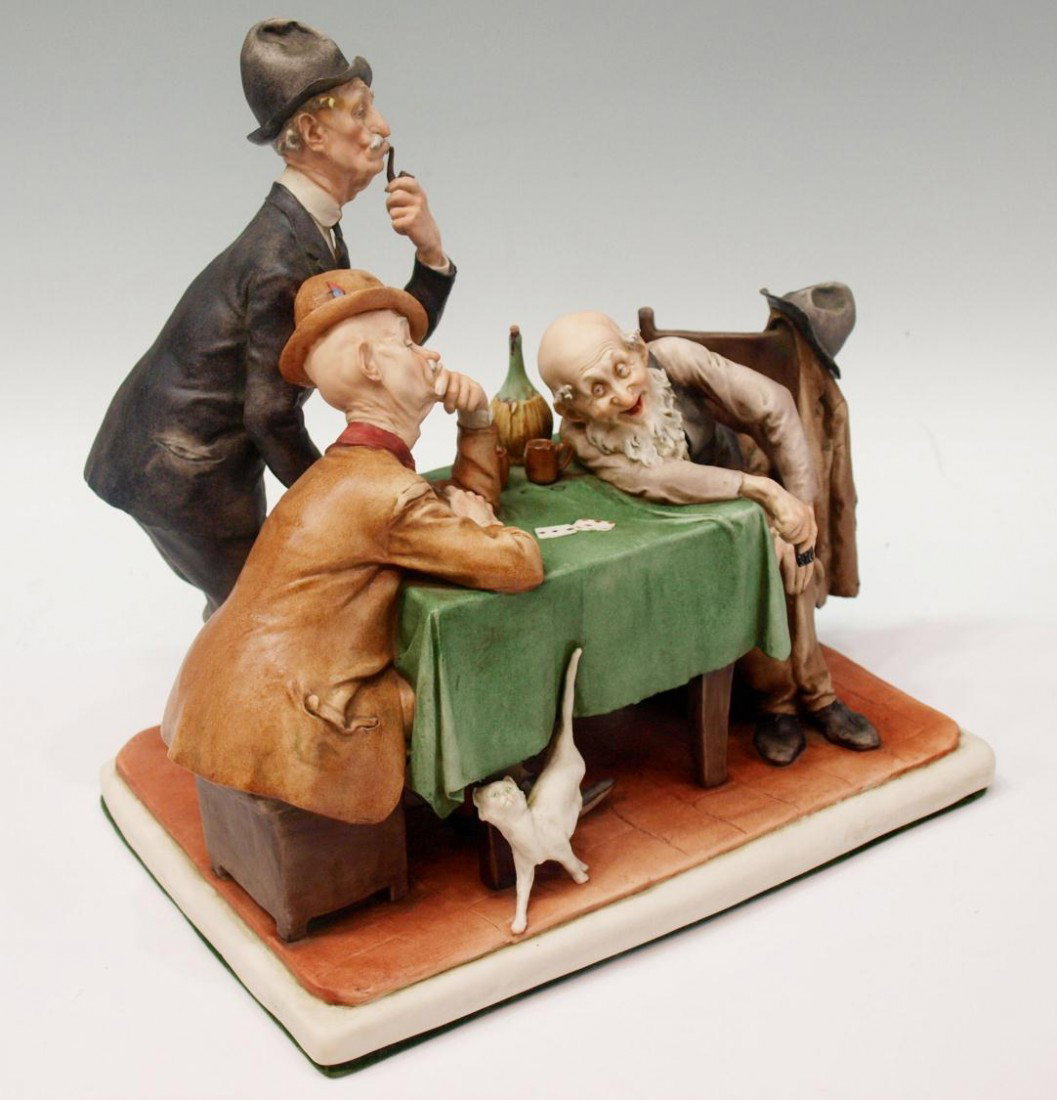 ITALIAN PORCELAIN FIGURAL GROUP, G. CALLE, 1961: Italian porcelain figural group, The Card Game, signed G. Calle Works of Art Italy 99015, dated 1961, minor flakes to hat brim and feathers, 12.25"h, 12"l, 8.5"w, 15lbs Start Price: $80.00