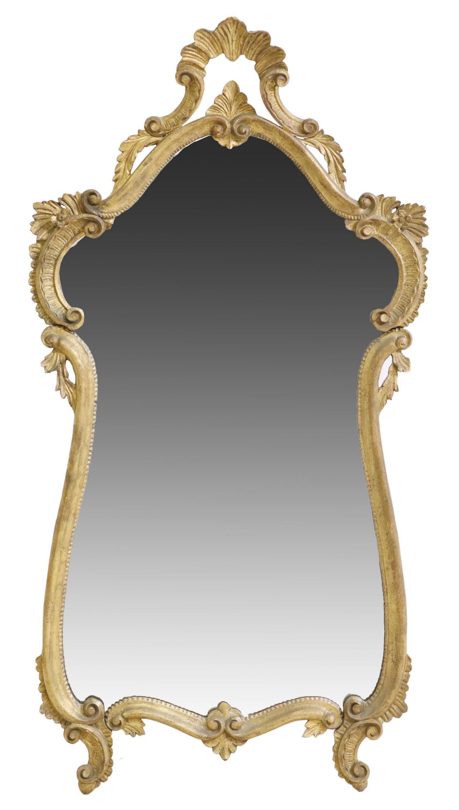 ITALIAN LOUIS XV STYLE GILTWOOD WALL MIRROR: Italian Louis XV style giltwood wall mirror, 19th c., having pierced rocaille crest, over shaped frame, encasing flat mirror plate, rising on scrolled feet, tag to back, approx 53.25"h, 28"w, 24.5lbs 