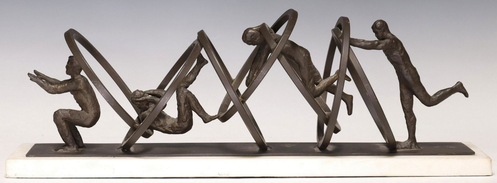 GLOBAL VIEWS IRON SCULPTURE JUMPING THROUGH HOOPS (1 of 4)