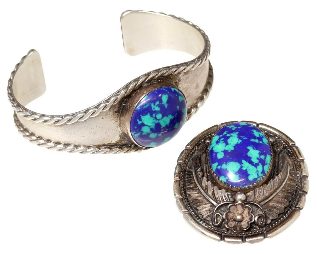 (2) NAVAO STERLING & AZURITE CUFF & PENDANT BROOCH: (lot of 2) Native American sterling silver jewelry, both signed T, possibly Florence Tahe (Navajo, 20th c.), with inset blue and green mottled stone, likely azurite, including: (1) cuff bracelet, with